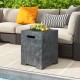 Outdoor gas tank storage cover table in dark gray magnesium oxide, doubles as a side table with cut-out handles.