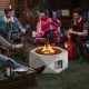 Hexagon terrazzo propane fire pit table with stainless steel burner, providing 40,000 BTU warmth for outdoor gatherings.