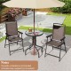 Patio round table with rippled tempered glass and two folding chairs, perfect for outdoor relaxation on porches or.