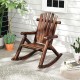 Adirondack rocking chair in brown solid wood, featuring ergonomic design and slatted surface, ideal for outdoor.