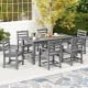 Gray HDPE outdoor dining set for 6, featuring sturdy chairs and a large table, perfect for outdoor dining in any season.
