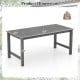 Gray HDPE outdoor dining table for 6, featuring a wood-like tabletop and umbrella hole, measuring 67" x 32".