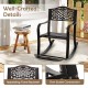 Brown patio rocking chair featuring a floral backrest, ergonomic design, and footrest, ideal for outdoor relaxation.