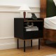 Black nightstand with drawer and open shelf, featuring a wide tabletop and metal legs, ideal for bedroom or living room.