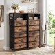 Modern bedside table with brown wood-like surface, 5 fabric drawers, and integrated charging station for versatile.