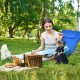 Two adjustable lounge chairs in stripe-blue with a folding table, perfect for outdoor relaxation and sunbathing.