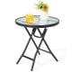 Round patio side table with tempered glass tabletop, black powder-coated steel frame, ideal for poolside or backyard.