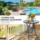 Patio side table with tempered glass tabletop, compact folding design for poolside or backyard leisure activities.