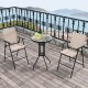 Outdoor bistro set featuring two beige folding chairs and a round table, perfect for patio or poolside relaxation.