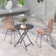 Round bistro table with tempered glass top and sturdy metal frame, perfect for backyard or poolside dining.