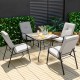 Patio dining set featuring stackable cushioned chairs and a tempered glass tabletop, ideal for outdoor relaxation.