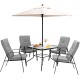Patio dining set featuring four stackable cushioned chairs and a large umbrella, perfect for outdoor gatherings.