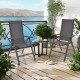 Two gray folding patio dining chairs with adjustable backrests, perfect for outdoor relaxation on a balcony or garden.