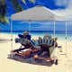 Gray 6.6 x 6.6 feet outdoor pop-up canopy tent providing shade for beach relaxation, featuring a heavy-duty steel frame.