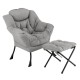 Gray modern accent chair with folding footrest, soft head pillow, and ergonomic design for ultimate relaxation.