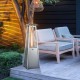 Compact 10,000 BTU stainless steel tabletop patio heater with glass tube, providing 360° heat for outdoor gatherings.