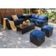 8-piece patio furniture set featuring navy cushions, tempered glass table, and storage box for outdoor relaxation.