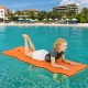 Bright orange 3-layer foam floating pad with head support, ideal for lakes, pools, and beach relaxation.