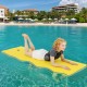 Bright yellow 3-layer foam floating pad in use on water, featuring a smooth surface for comfort and relaxation.