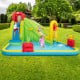 Outdoor inflatable water bounce house with slide, made of premium Oxford material, perfect for garden fun.