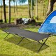 Gray folding camping cot with sturdy iron frame, portable design, ideal for camping, hiking, or office naps.
