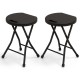 Set of 2 black collapsible round stools with handles, featuring a sturdy metal frame and foldable design for easy.