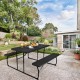 Folding picnic table bench set with wood-like texture in black, perfect for outdoor gatherings and parties.
