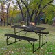 Close-up of the wood-like texture on the black folding picnic table, showcasing its durable surface for outdoor use.