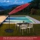 10 feet solar offset hanging umbrella in wine color with adjustable tilt, providing shade for outdoor relaxation by the.