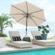Beige outdoor patio umbrella with tilt adjustment and crank, ideal for sun protection in gardens and backyards.
