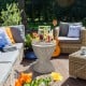 Rattan-style 8-gallon patio cooler bar table with retractable tabletop, perfect for outdoor gatherings and easy.