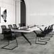 Side view of an office guest chair featuring breathable mesh back and armrests, designed for comfort in waiting areas.