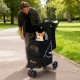 Lightweight black pet stroller with adjustable canopy, safety leash, and large rear entrance for comfortable pet.