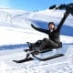 Kids snow sled in gray with steering wheel and double brakes, designed for safety and fun on snowy hills.