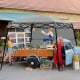 Portable 7 x 7 feet gray canopy tent with sturdy frame, ideal for outdoor activities and easy to transport with a.