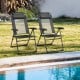 Two gray adjustable folding recliner chairs with steel frames, perfect for outdoor relaxation by the poolside.