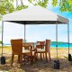8’x8' outdoor pop-up canopy tent in white set up beside a table and chairs, providing ample shade for outdoor.