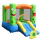 Brightly colored inflatable castle bounce house with slide, mesh walls, and built-in basketball rim for kids' playtime.