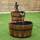 Side view of the 2-tier outdoor wooden barrel waterfall fountain with smooth carbonized wood and rust-resistant iron.