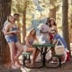 Picnic table bench set in green, made of HDPE, perfect for outdoor camping and gatherings in nature.