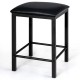 Black faux leather stool with durable iron legs, designed for space-saving in kitchens or dining rooms.
