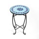 Round accent table with a colorful cobalt blue mosaic top and sturdy black steel frame, ideal for outdoor or indoor use.