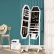 Freestanding white jewelry cabinet armoire with LED mirror, lockable door, and organized storage for jewelry and makeup.