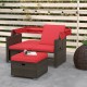 Outdoor patio rattan daybed with red cushions, featuring adjustable backrests and retractable canopy for versatile.