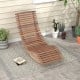 Acacia wood rocking chair with slatted seat and high back, perfect for backyard relaxation and stylish outdoor decor.