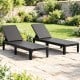 Black outdoor chaise lounger chairs with waterproof rattan textured surface, adjustable backrest for sunbathing or.