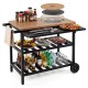 Outdoor dining cart with BBQ grill, foldable side panel, and spacious countertop for versatile food preparation.