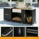 Outdoor grill table with sink and drainage, heavy-duty metal construction, and multiple storage areas for patio use.