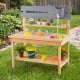 Outdoor kids mud kitchen featuring a natural fir wood design, pull-out tabletop, and built-in water basin for.