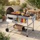 Movable outdoor grill table with spacious top, adjustable clips for 18/22 inch kettles, and convenient storage for.